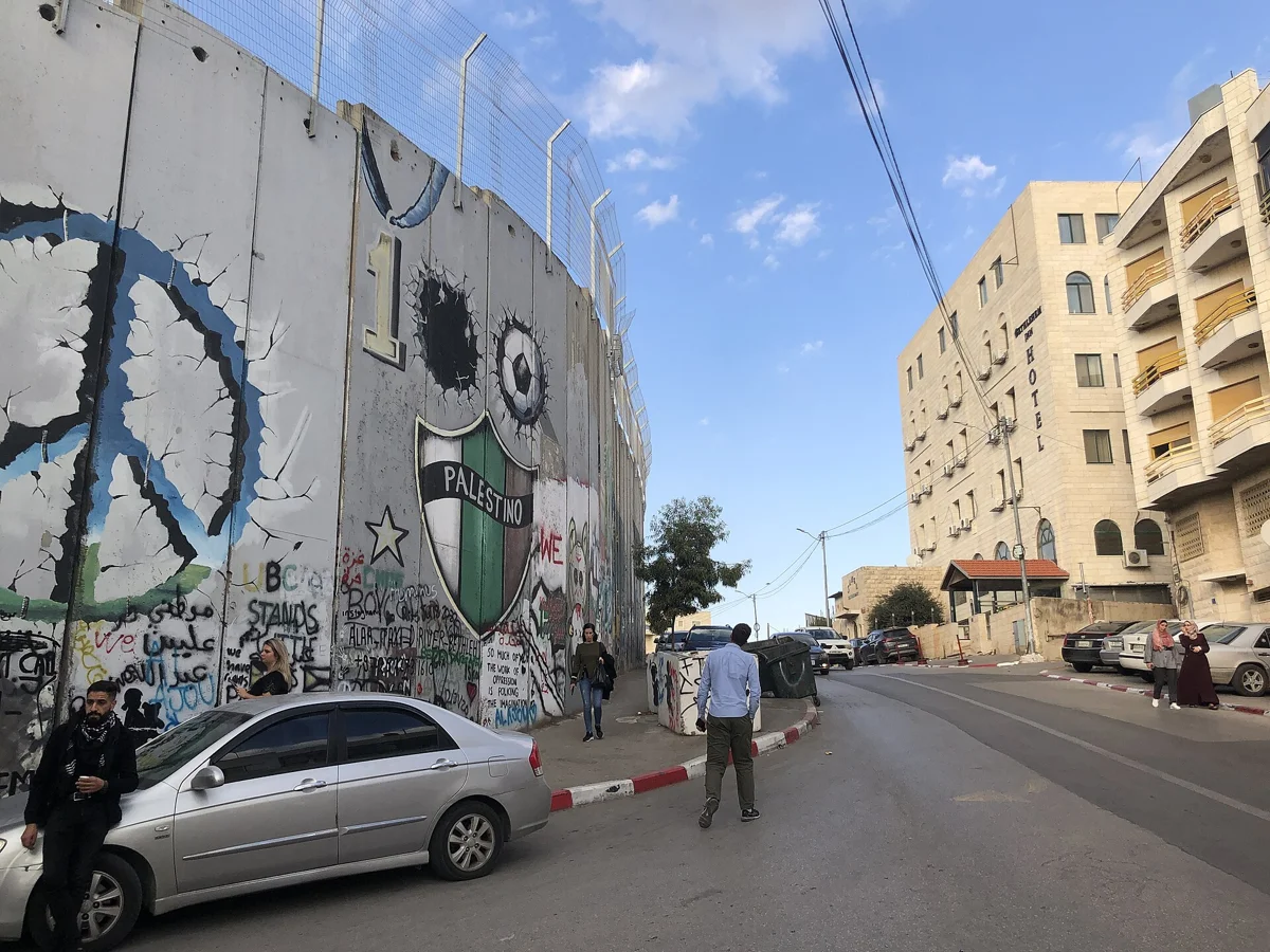 Graffiti on the separation wall in Bethlehem, part of the picture when asking if it is safe to visit Bethlehem