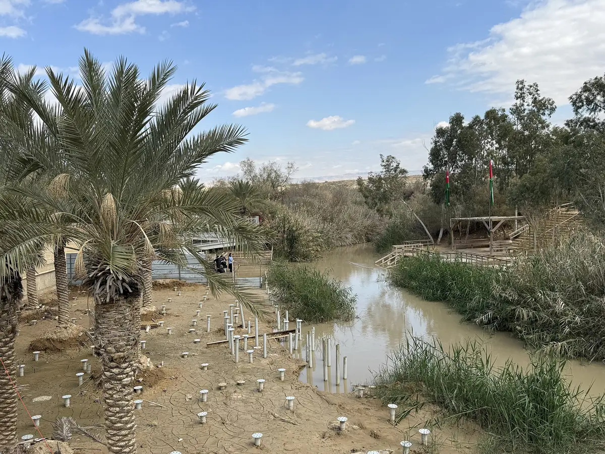 The Jordan River at the Qasr al-Yahud baptism site, a stop on West Bank day trips from Jerusalem
